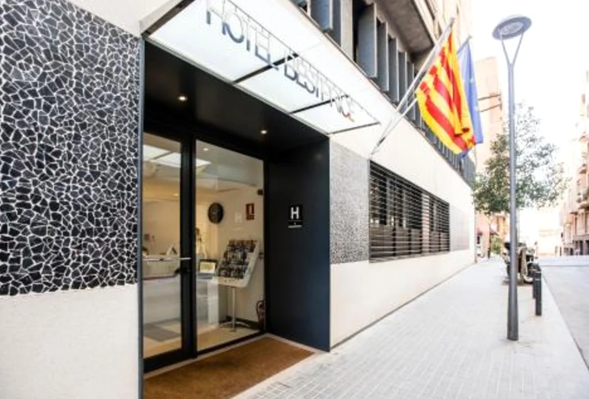 Entrance to an accommodation that is better for practicality and local sensibility than the noisy city center.